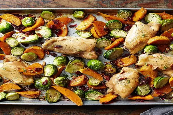 Maple Roasted Chicken Thighs with Sweet Potato Wedges and Brussels Sprouts