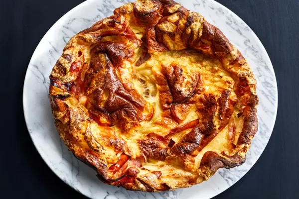 Polenta Dutch Baby with Ham and Swiss